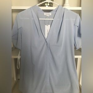 Light blue silky top